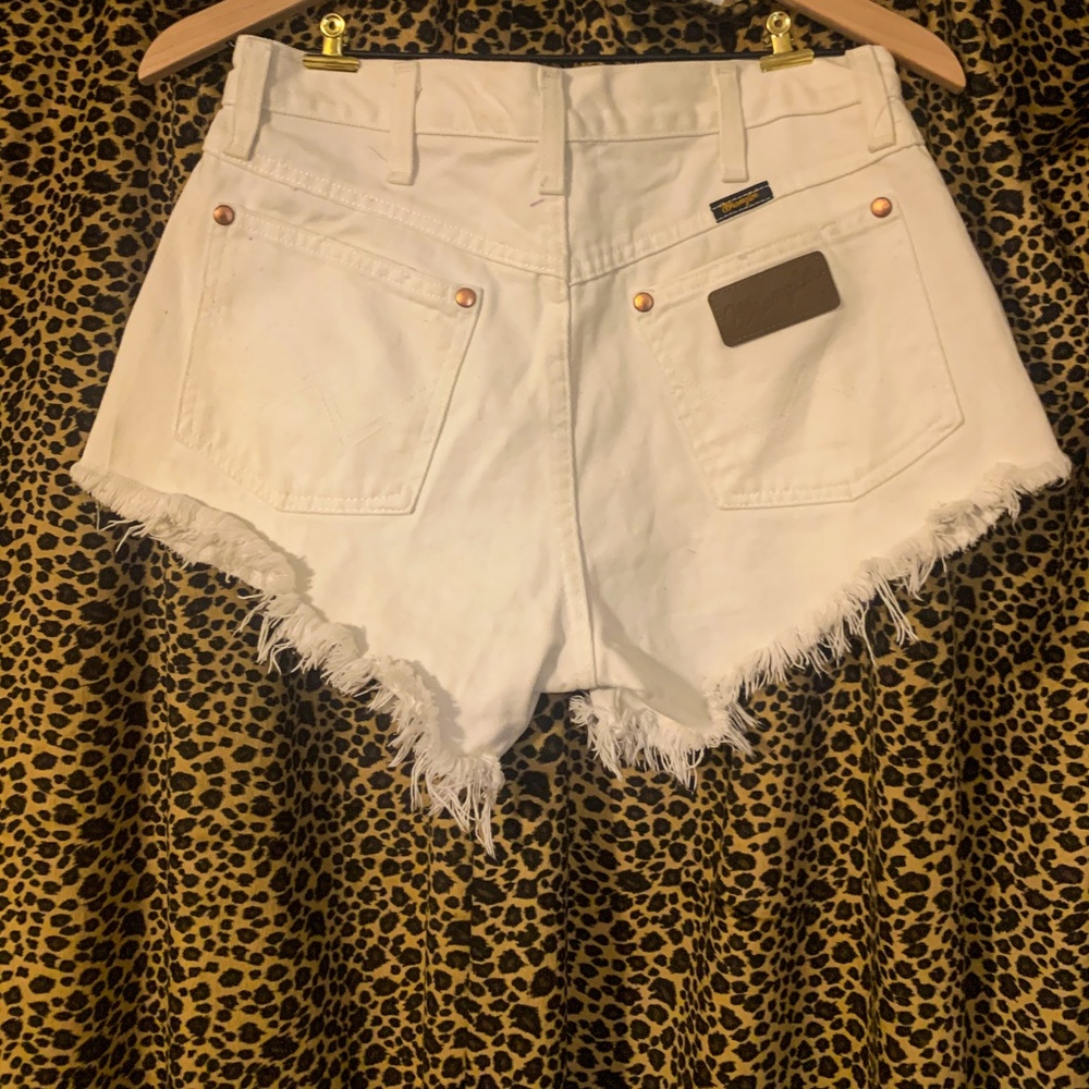 White Wrangler cutoff shorts